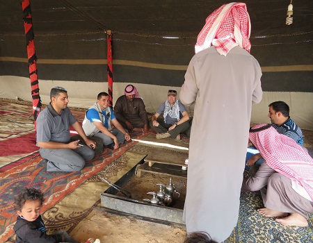 Dr. Vincent Munster,enjoys some Bedouin hospitality Photo: NIAID’s Dr. Vincent Munster,enjoys some Bedouin hospitality