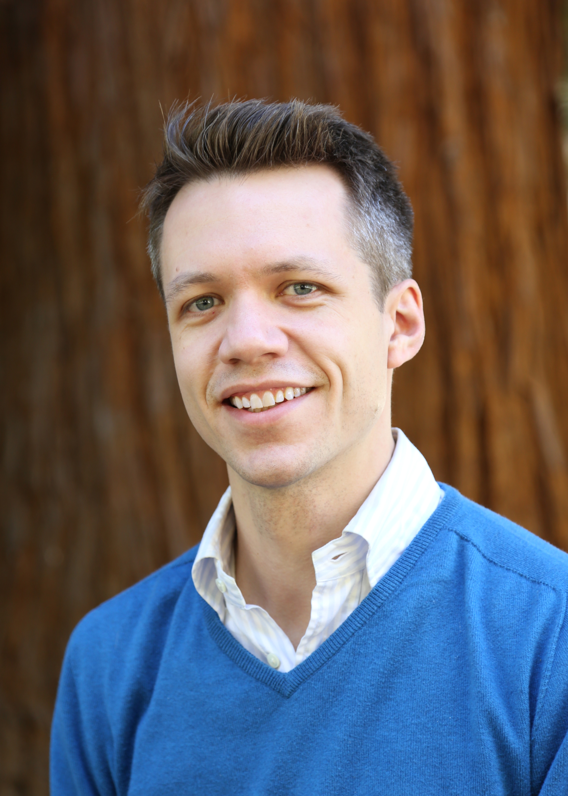 Headshot of Nathan Reticker-Flynn