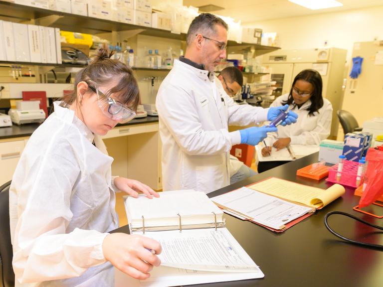 Scientists researching in a lab.