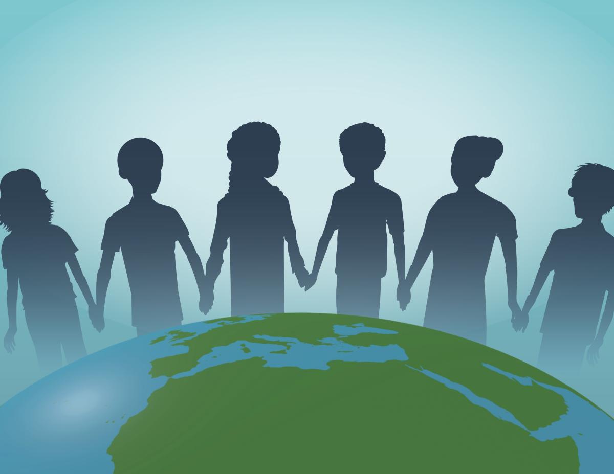 Cartoon of people holding hands over a globe.