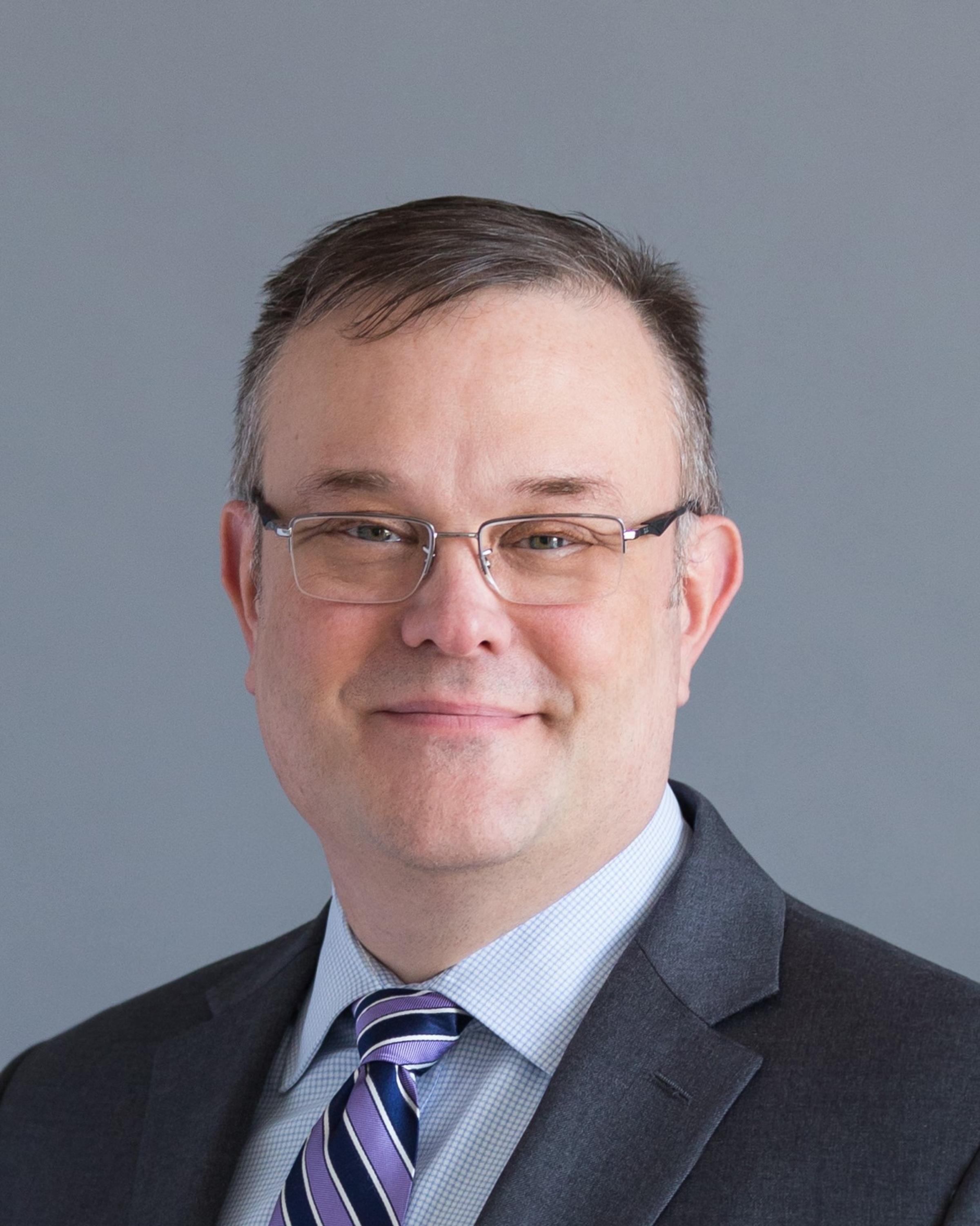 Headshot of John Beigel, M.D.