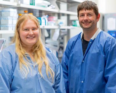 Hanna Anhalt and Kyle O'Donnell in a laboratory