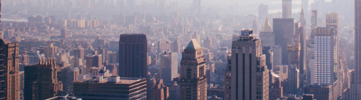 Photo of a smog covered city scape