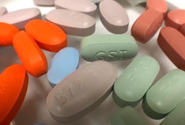 Many prescription antiretroviral pills of different colors used to treat HIV infection. Credit: NIAID
