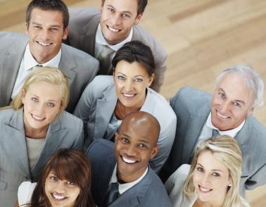 A group of diverse people looking up at the camera
