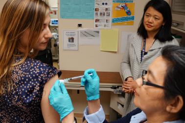 volunteer receives an experimental universal influenza vaccine