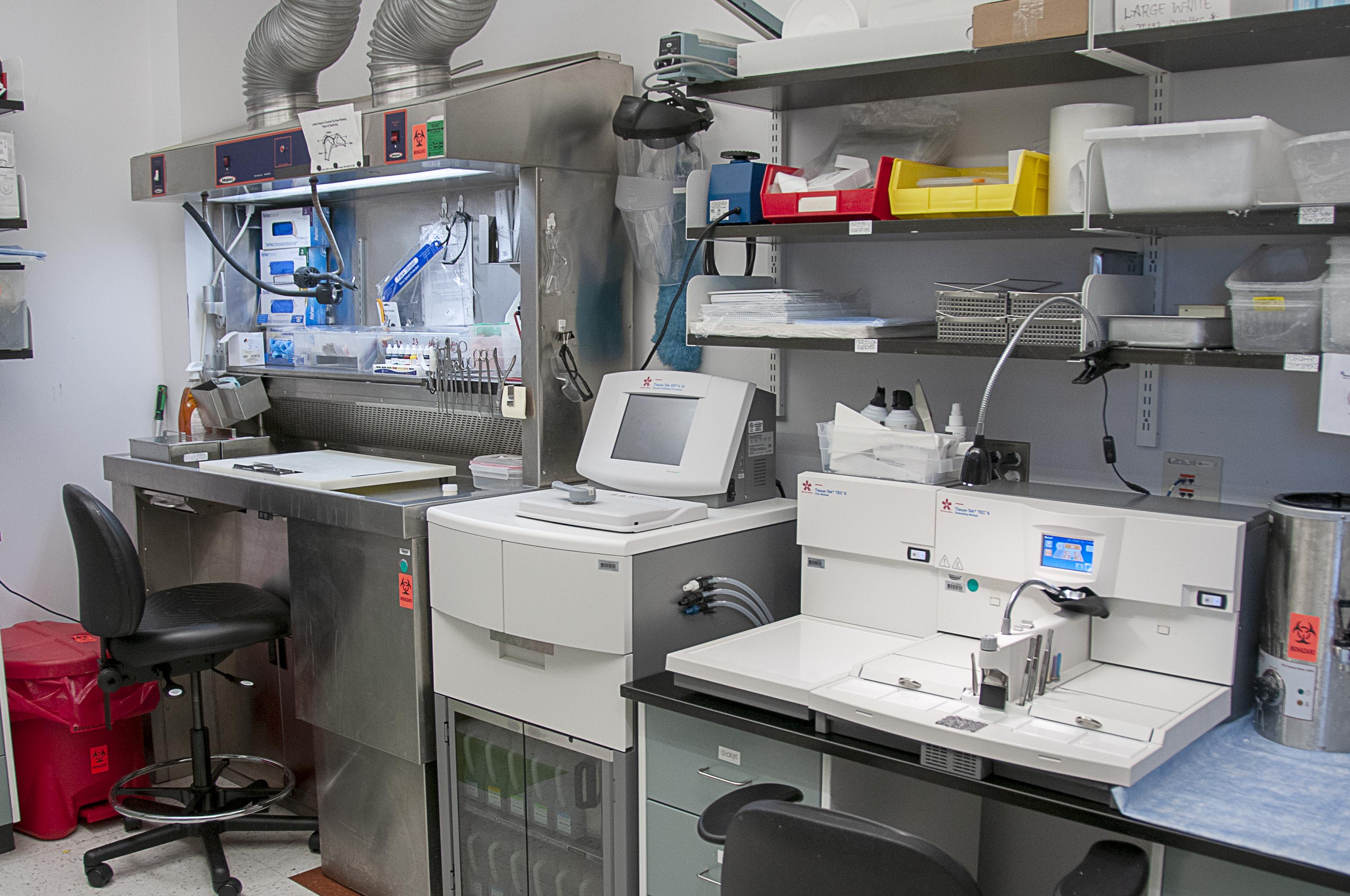 Mopec MB-600 adjustable elevating grossing station with backdraft ventilation, Tissue-Tek VIP-6 automated thermoregulated vacuum infiltration processor unit, and Tissue-Tek TEC-6 ergonomic embedding console and cryo module workstation