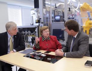 NIH Director Francis S. Collins and NCATS Director Christopher P. Austin talk with U.S. Senator Barbara A. Mikulski