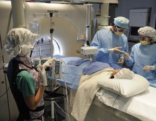 NIH experts care for a patient in Interventional Radiology