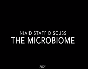A black title card with white text reading "NIAID Staff Discuss The Microbiome. 2021"