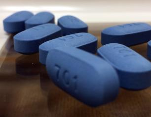 Several blue pills of PrEP
