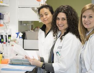 Image of three women scientists in a lab