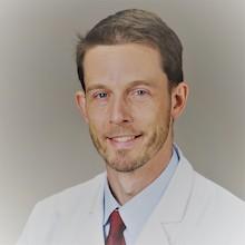 Headshot for Hans Ackerman, M.D., D.Phil., M.Sc.