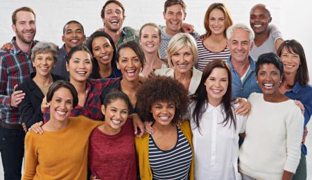 a group of smiling diverse people